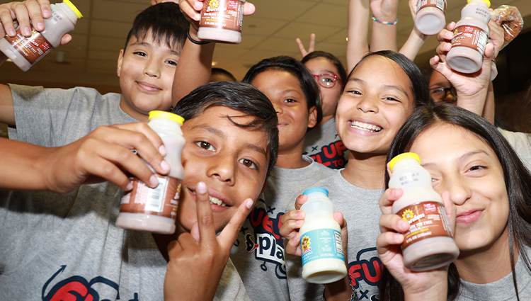 group of students drinking milk