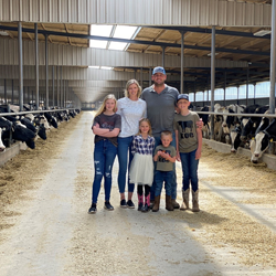 the Diepersloot family in their barn