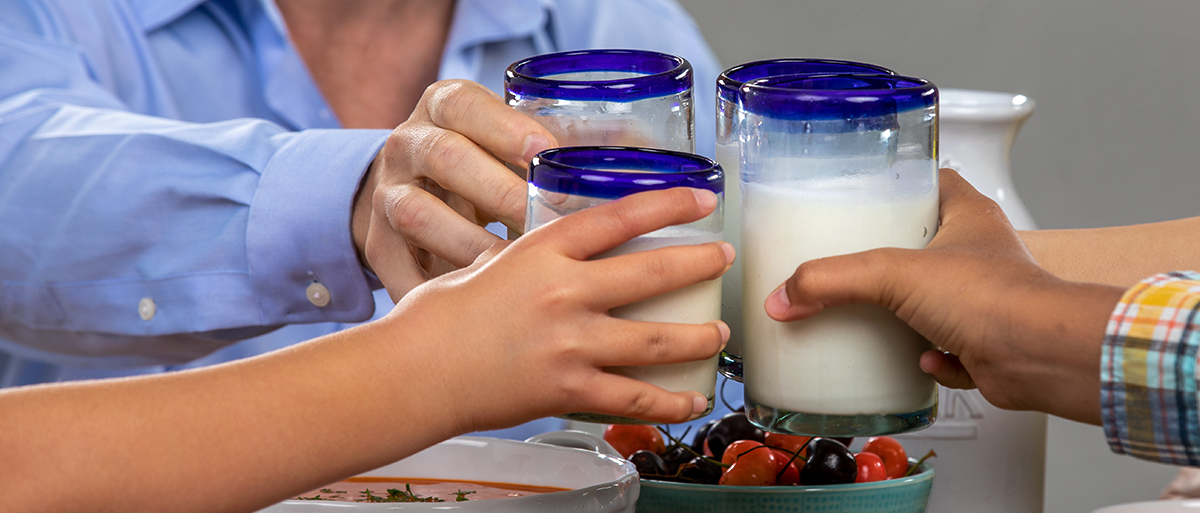 People drinking milk