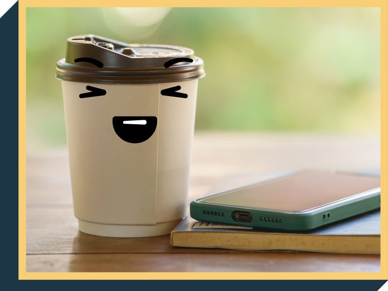 Coffee cup with a smiling face.