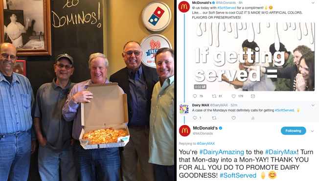 photo of dairy farmers with a pizza