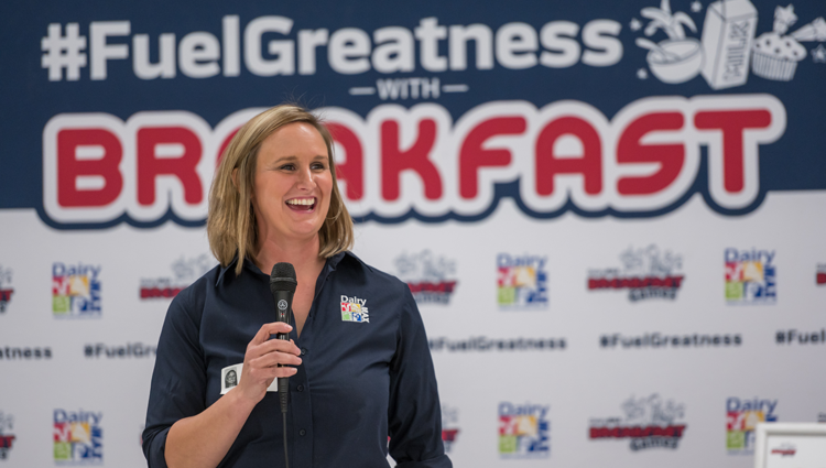 farmer Mikayla Krause speaking at the breakfast games