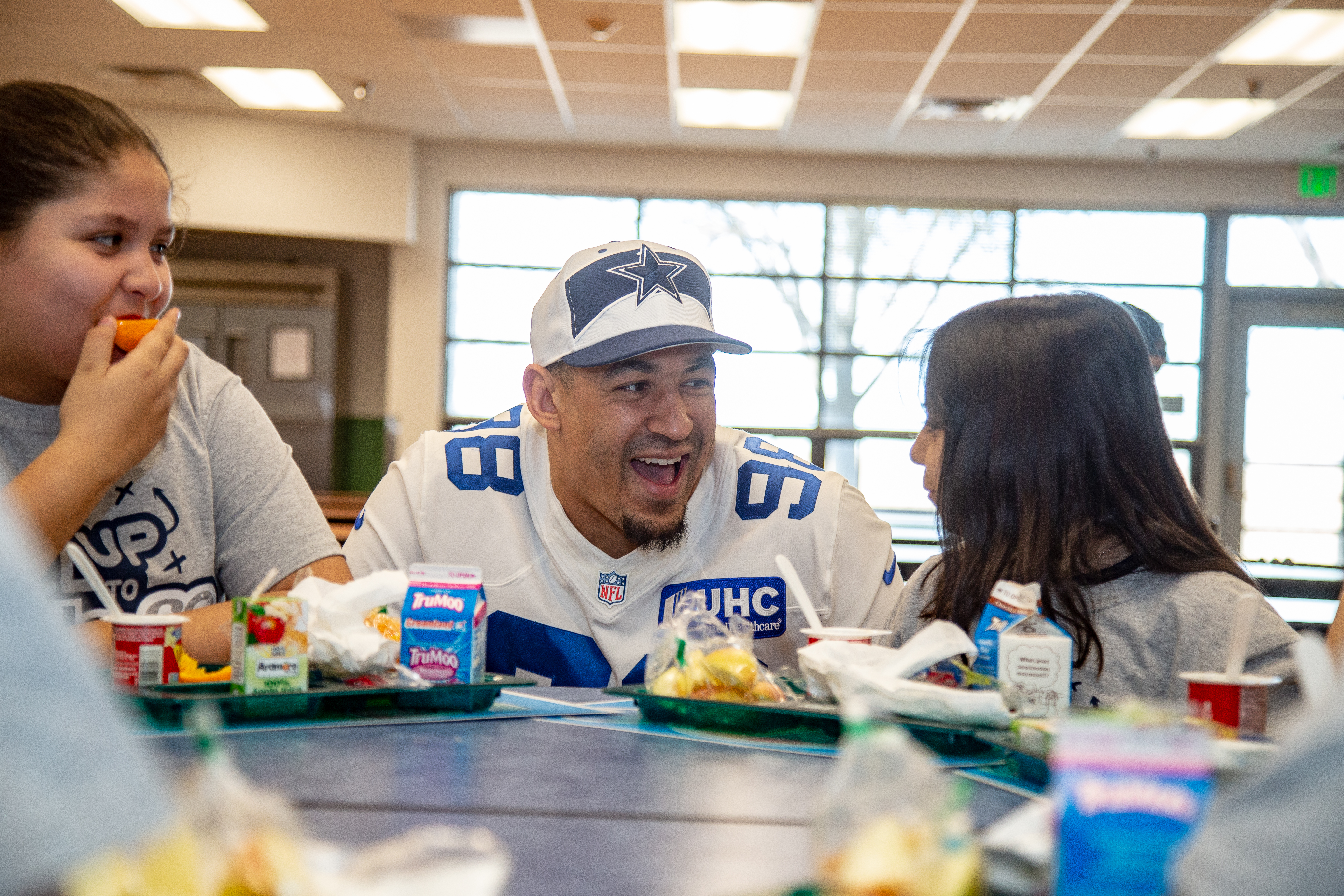Tyrone Crawford having breakfast with kids and laughing