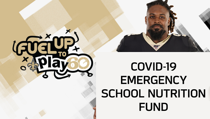 Cam Jordan with a sign that says "COVID-19 Emergency School Nutrition Fund"