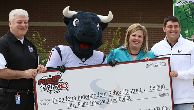 Toro helps present a grant check