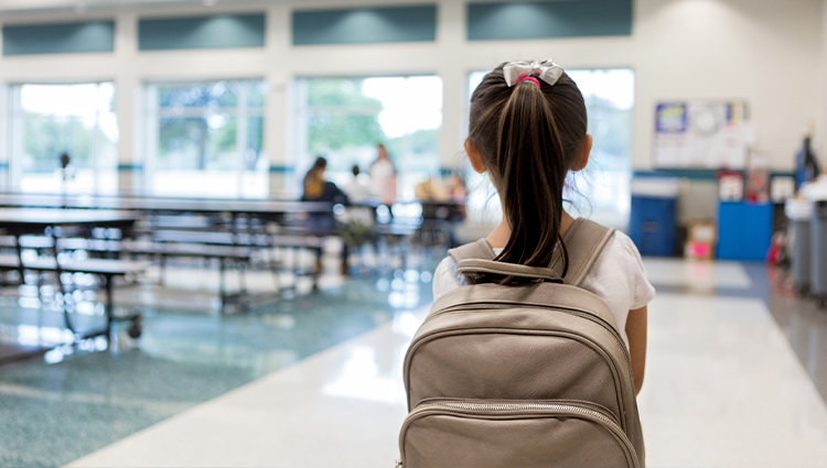 young person in a school cafeteria