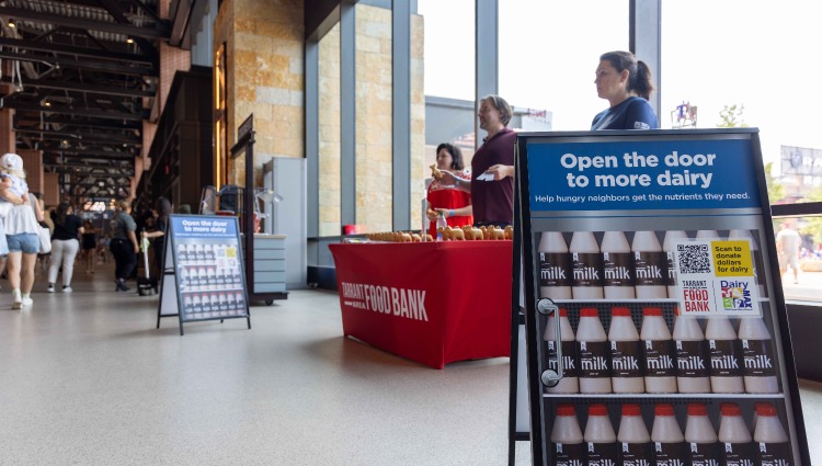 Call for monetary donations for dairy foods for the Tarrant Area Food Bank at a Texas Rangers game