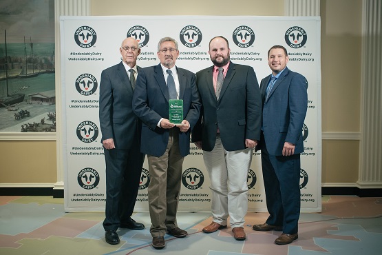 posing for a photo at the Sustainability awards