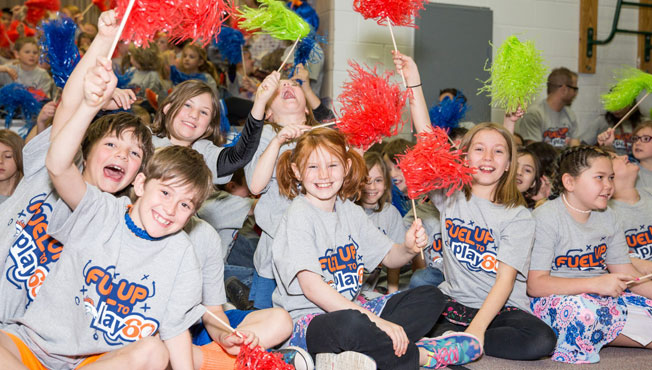 kids cheering at the breakfast games