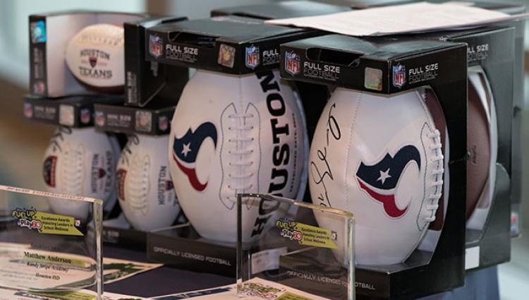 signed Texans footballs