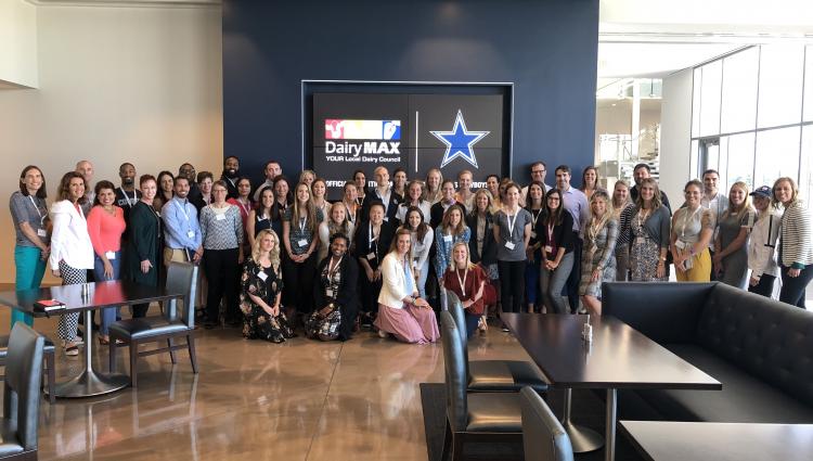 the group poses for a photo at the Star