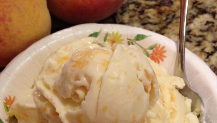 bowl of peach ice cream