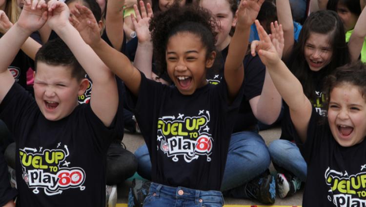 kids in fuel up to play 60 shirts cheering